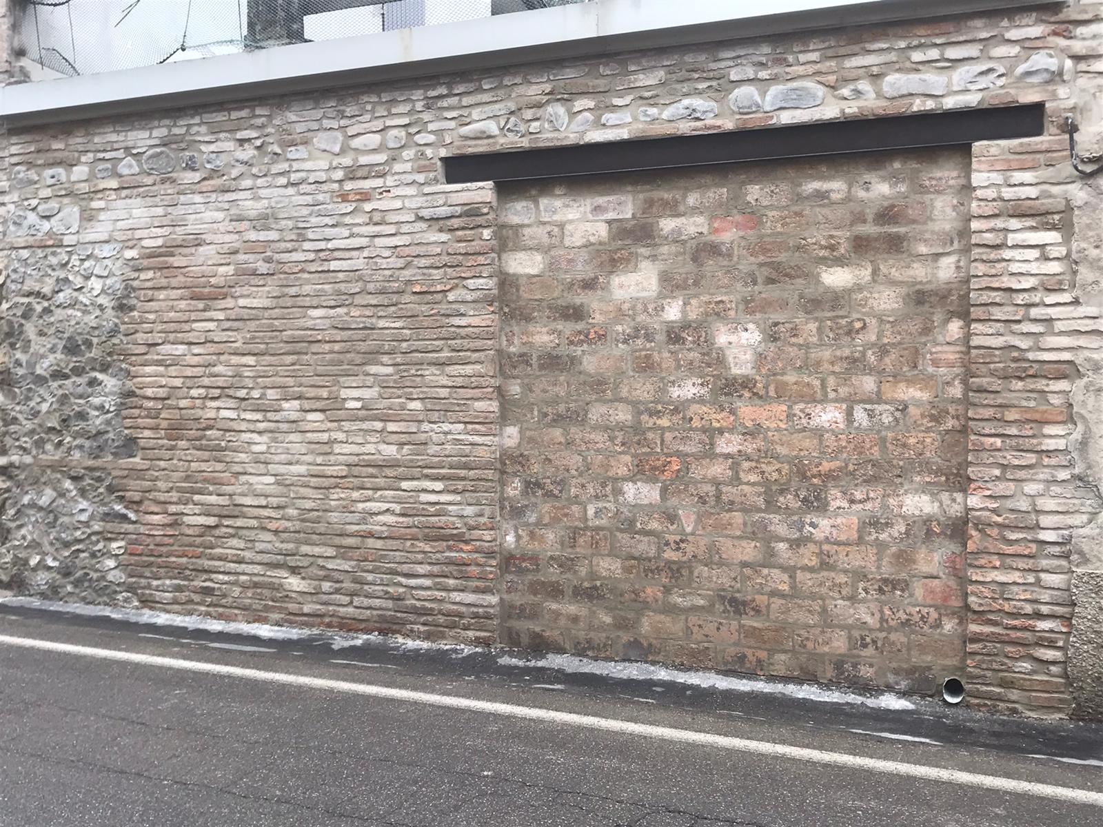 Ristrutturazione muro perimetrale in sassi e mattoni